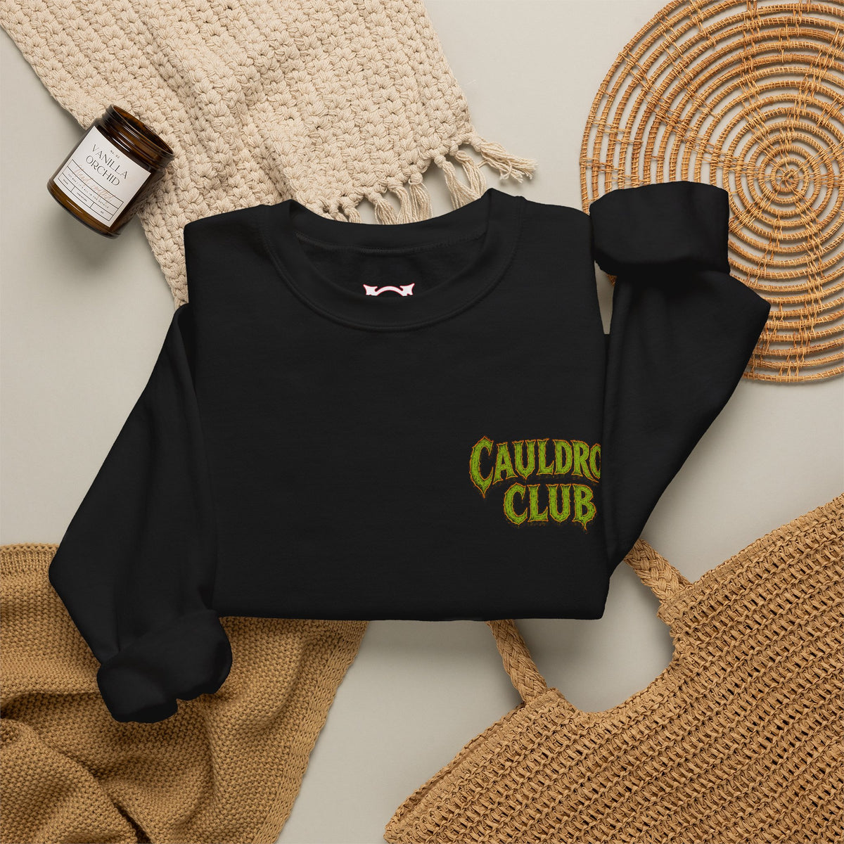 Cauldron Club Black Cat Sweatshirt in Black — folded view