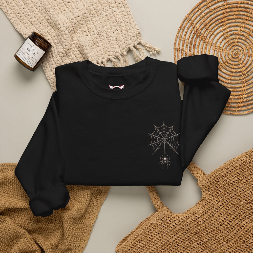 Spider Web Sweatshirt in Black — folded view