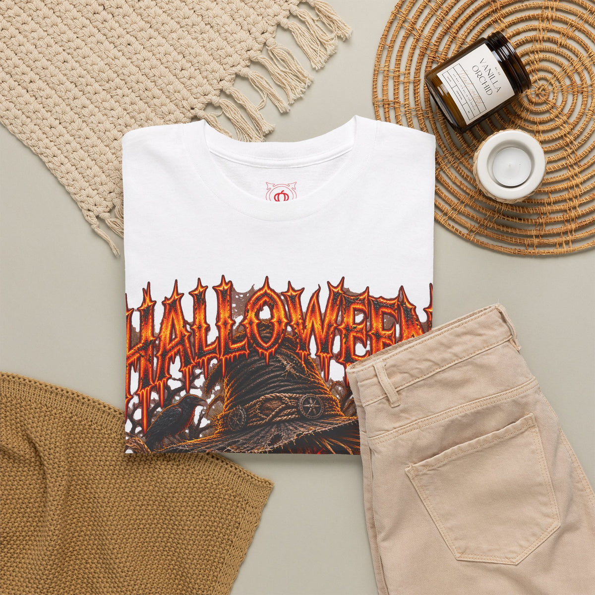 Trick or Treat Pumpkin Scarecrow T-Shirt in White — folded view