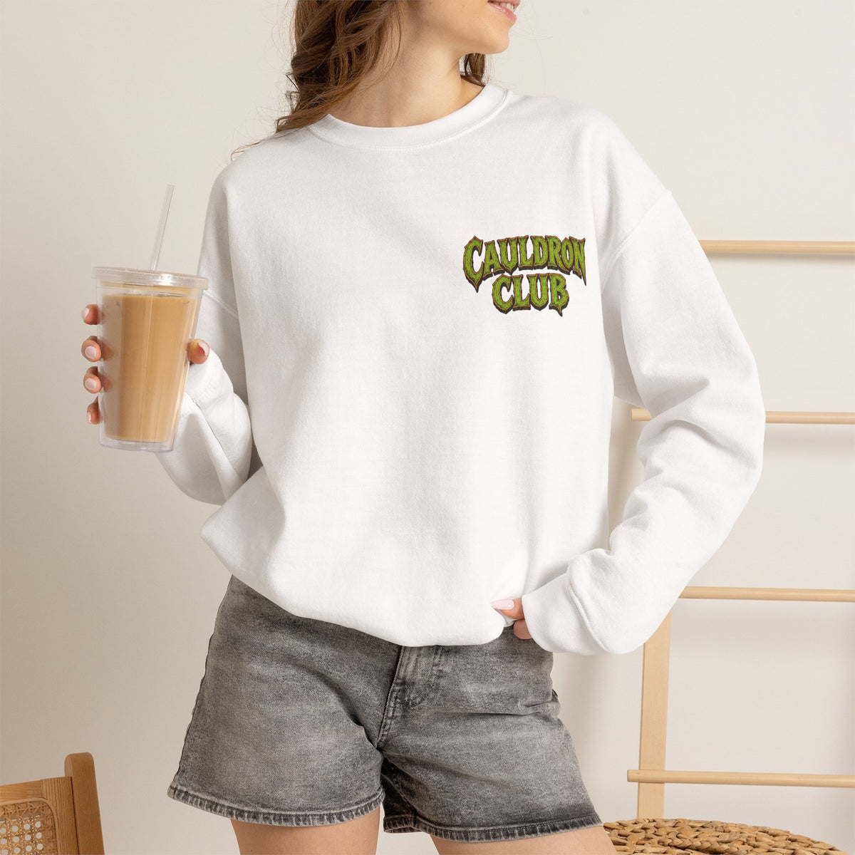 Cauldron Club Black Cat Sweatshirt in White — model view