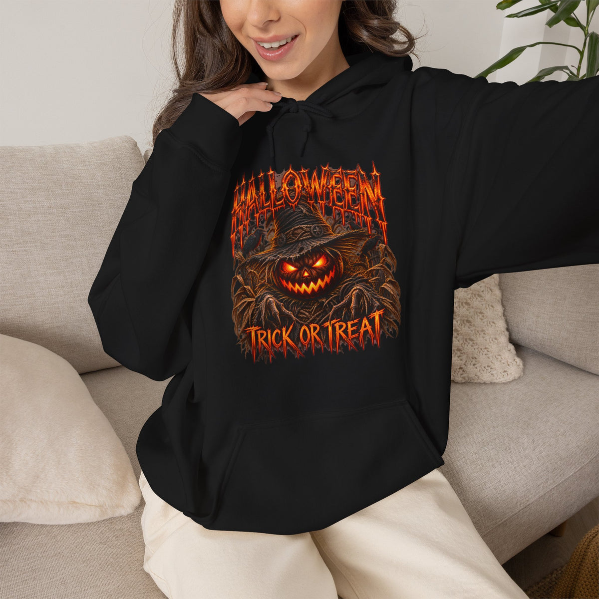 Trick or Treat Pumpkin Scarecrow Hoodie in Black — model view