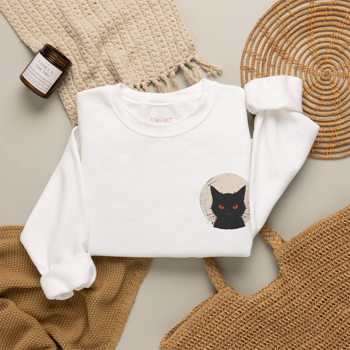 Black Cat Moon Sweatshirt in White — folded view