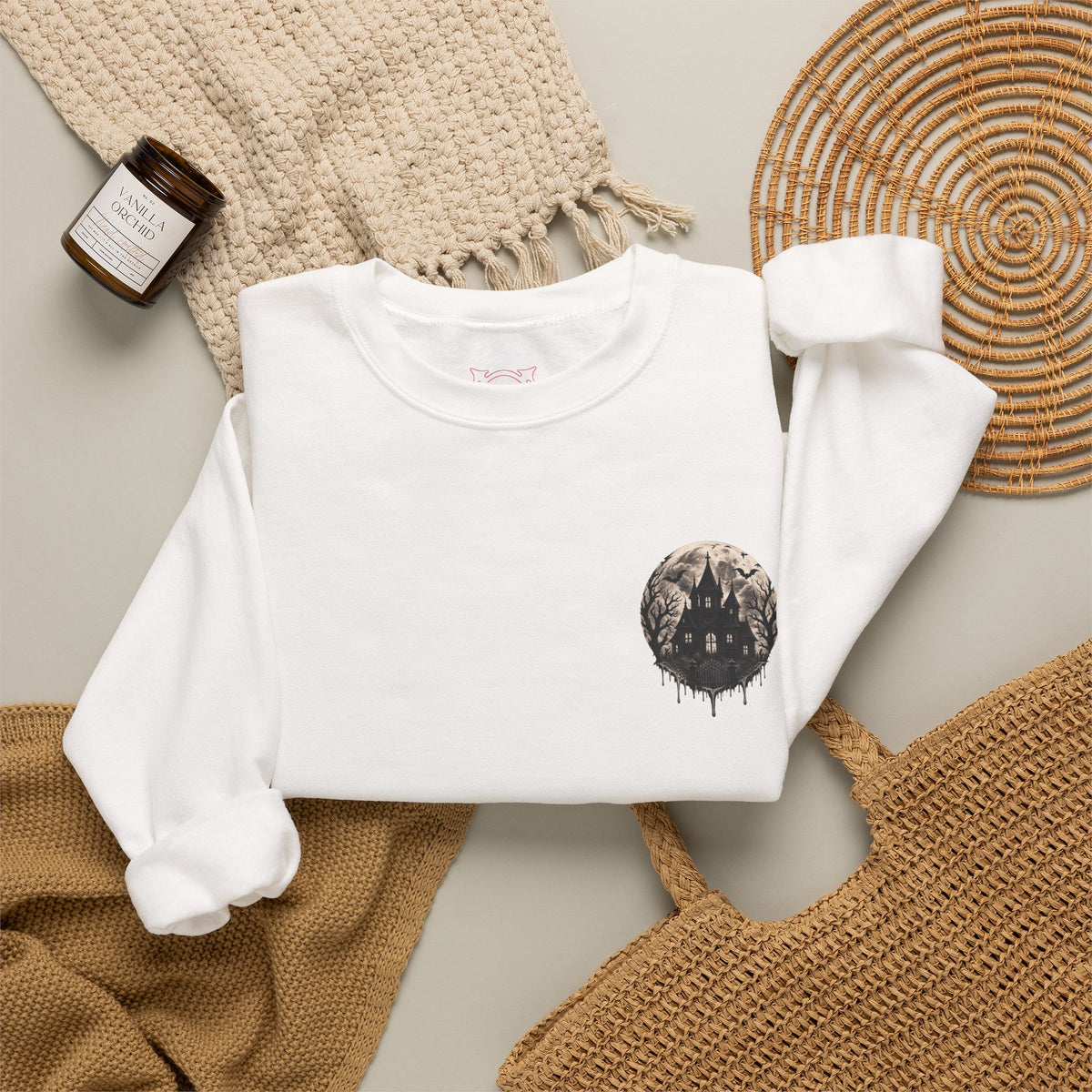 Moonlit House Sweatshirt in White — folded view