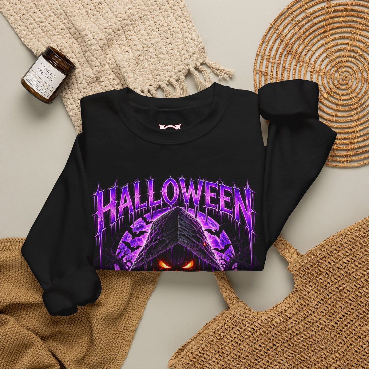 Fear the Night Pumpkin Sweatshirt in Black — folded view