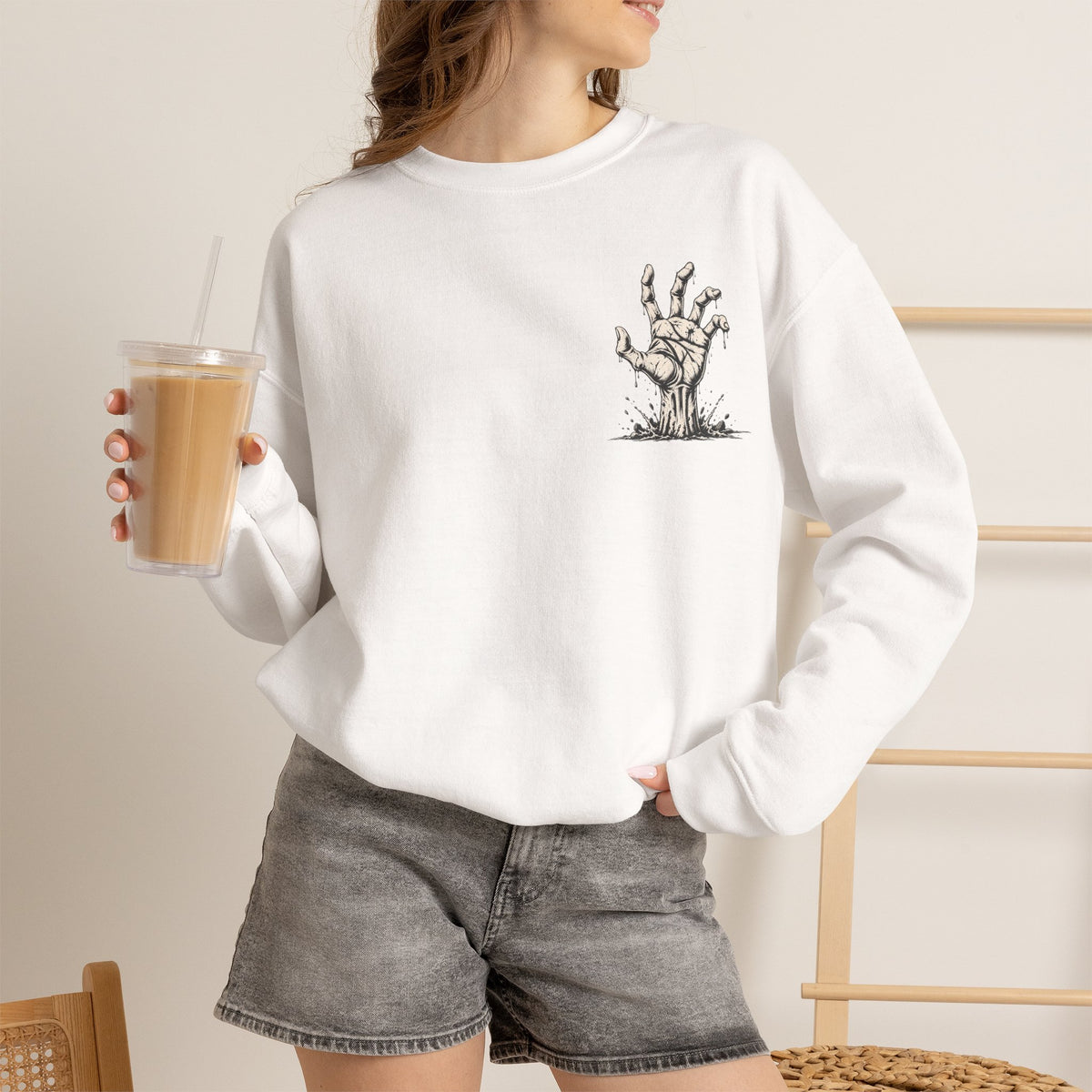 Still Reaching Zombie Hand Sweatshirt in White — model view