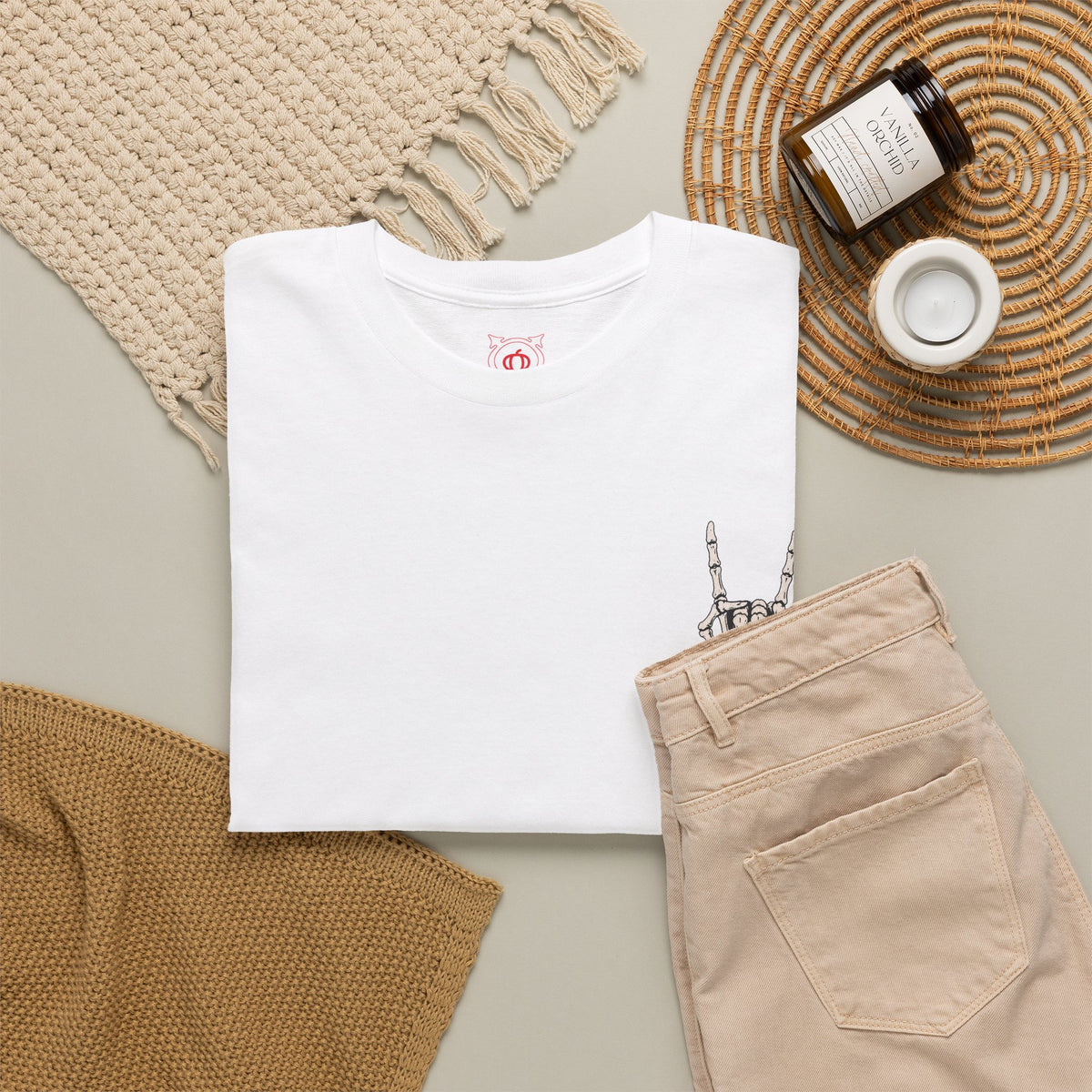 Bone Sign Skeleton Hand T-Shirt in White — folded view