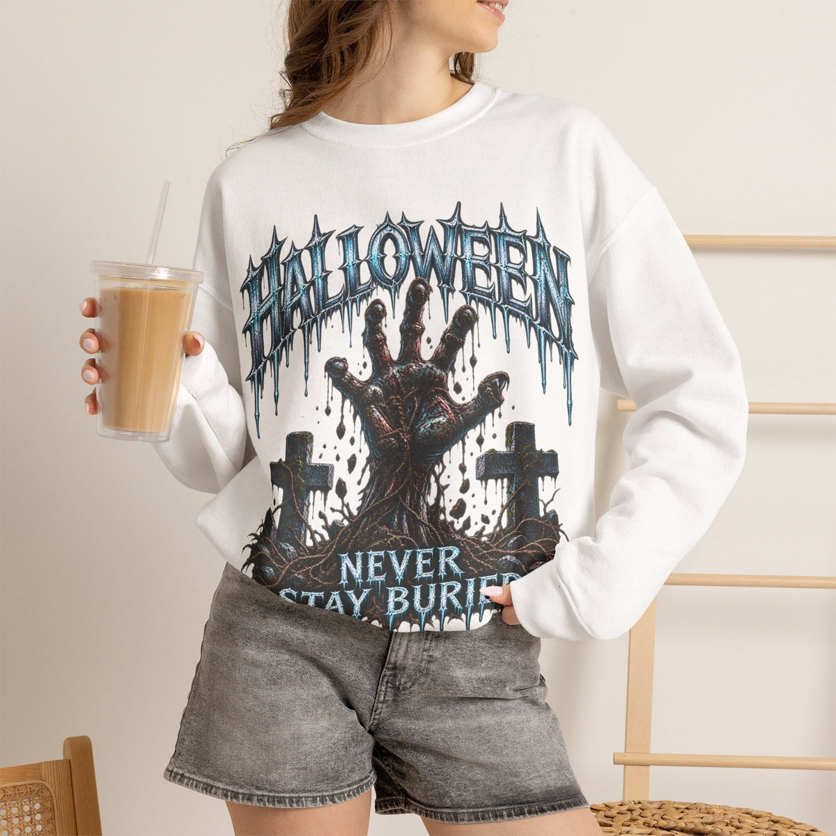 Never Stay Buried Zombie Hand Sweatshirt in White — model view