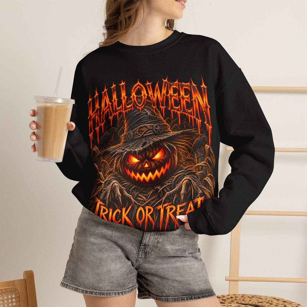 Trick or Treat Pumpkin Scarecrow Sweatshirt in Black — model view
