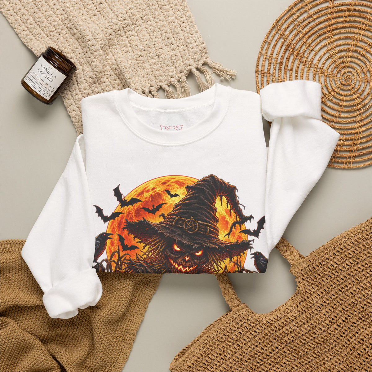 Fear Lives Here Scarecrow Sweatshirt in White — folded view