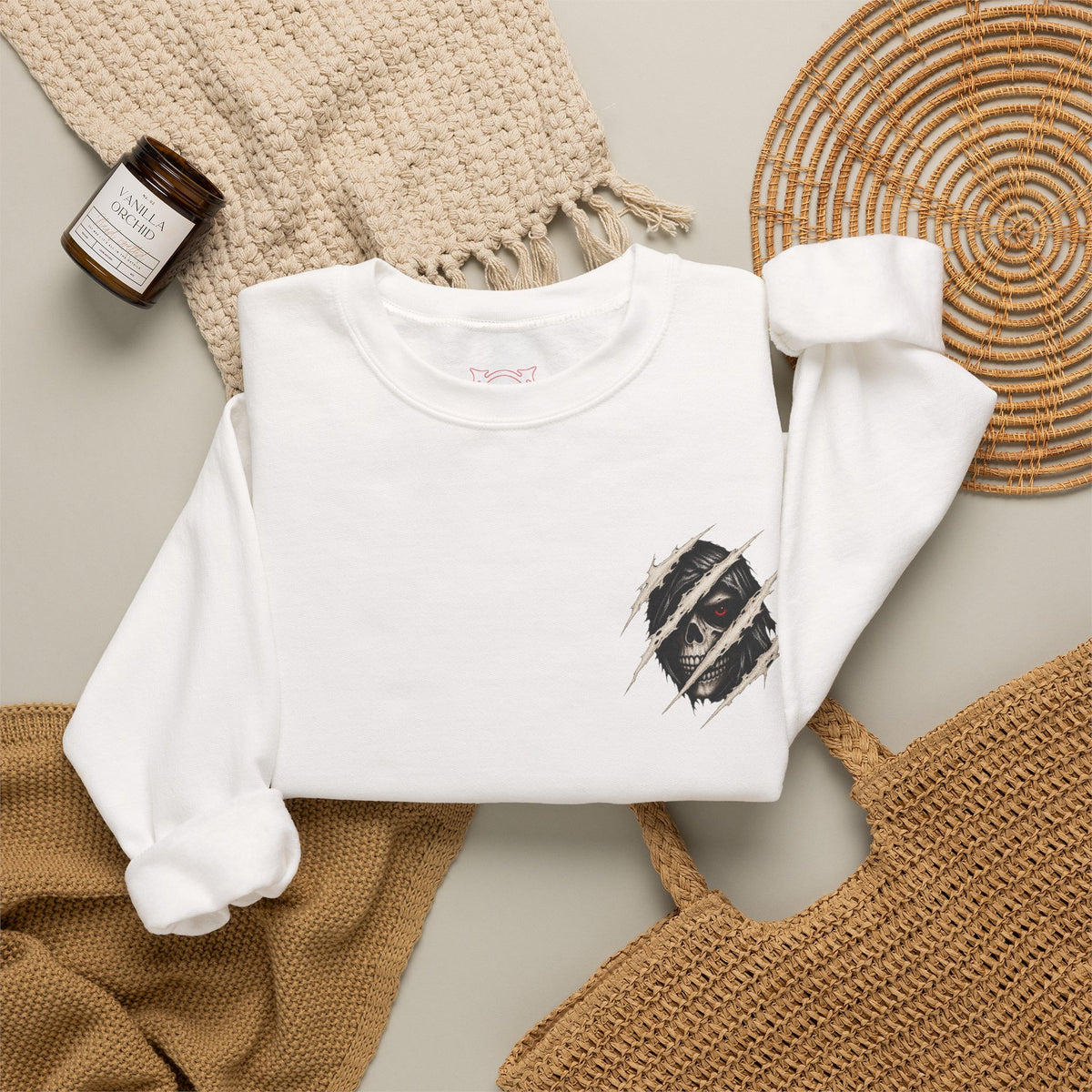 Beneath the Surface Skull Sweatshirt in White — folded view