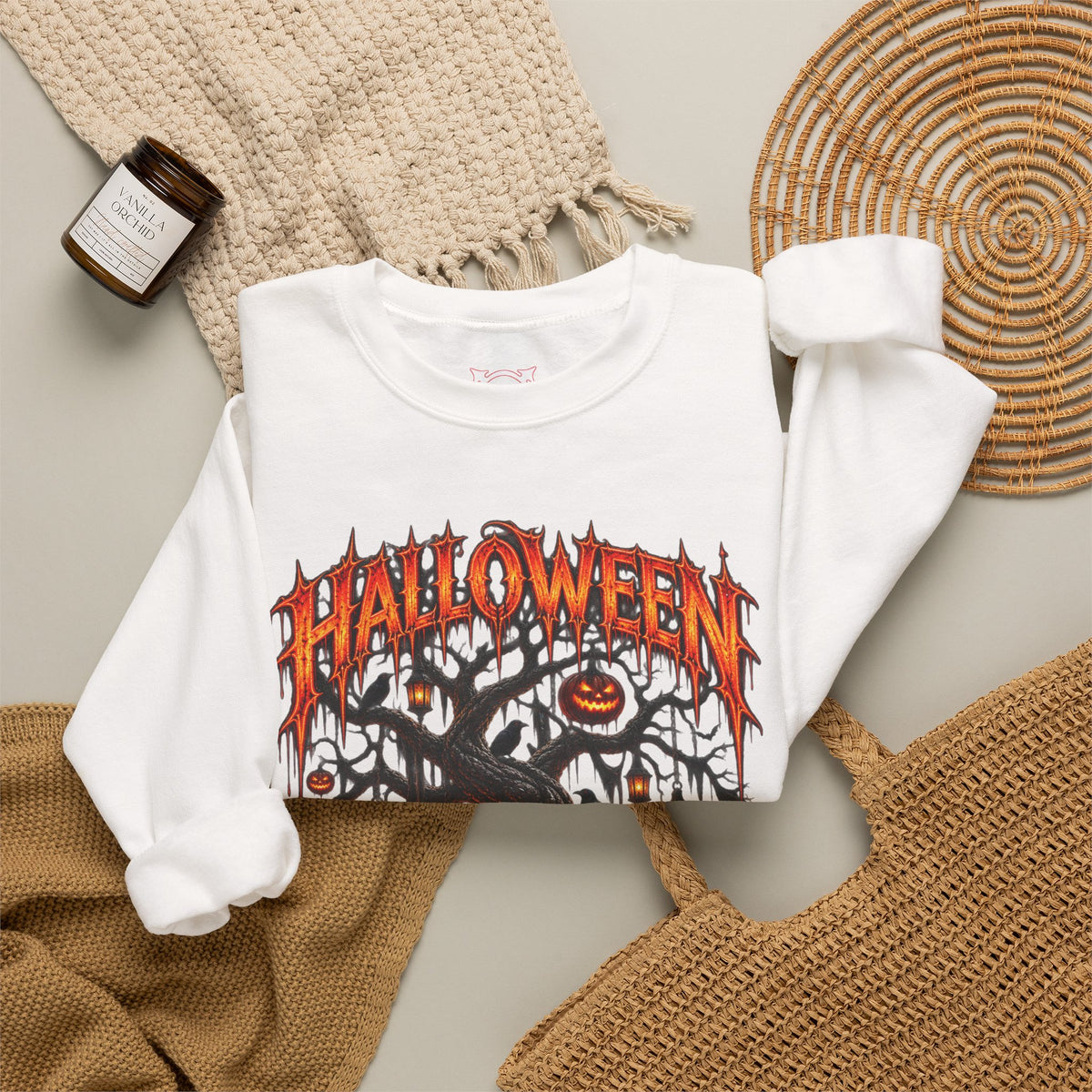 Darkness Grows Pumpkin Tree Sweatshirt in White — folded view