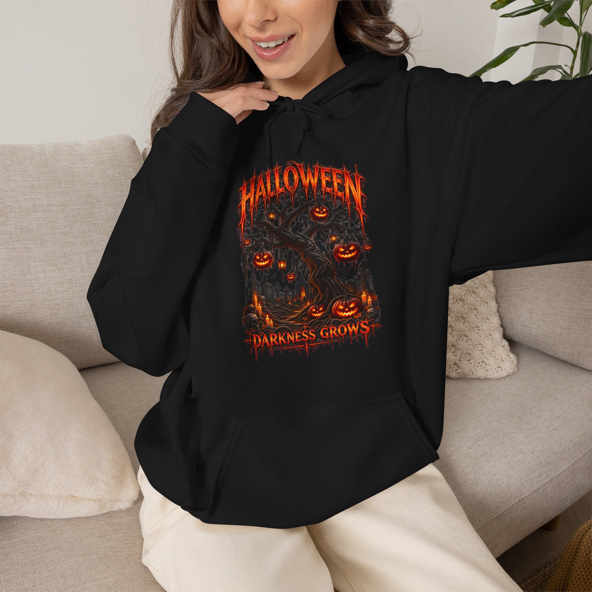 Darkness Grows Pumpkin Tree Hoodie in Black — model view
