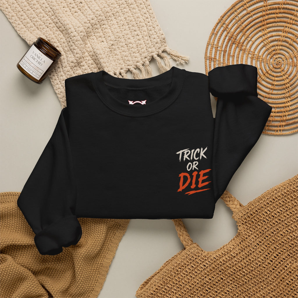 Trick or Die Halloween Sweatshirt in Black — folded view