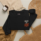 Trick or Die Halloween Sweatshirt in Black — folded view