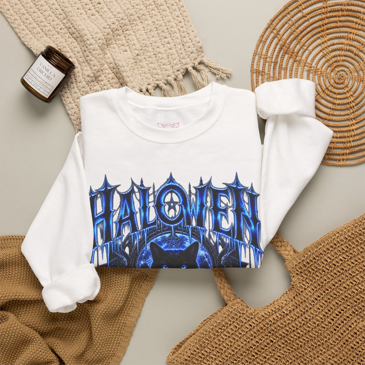 Black Cat Omen Sweatshirt in White — folded view