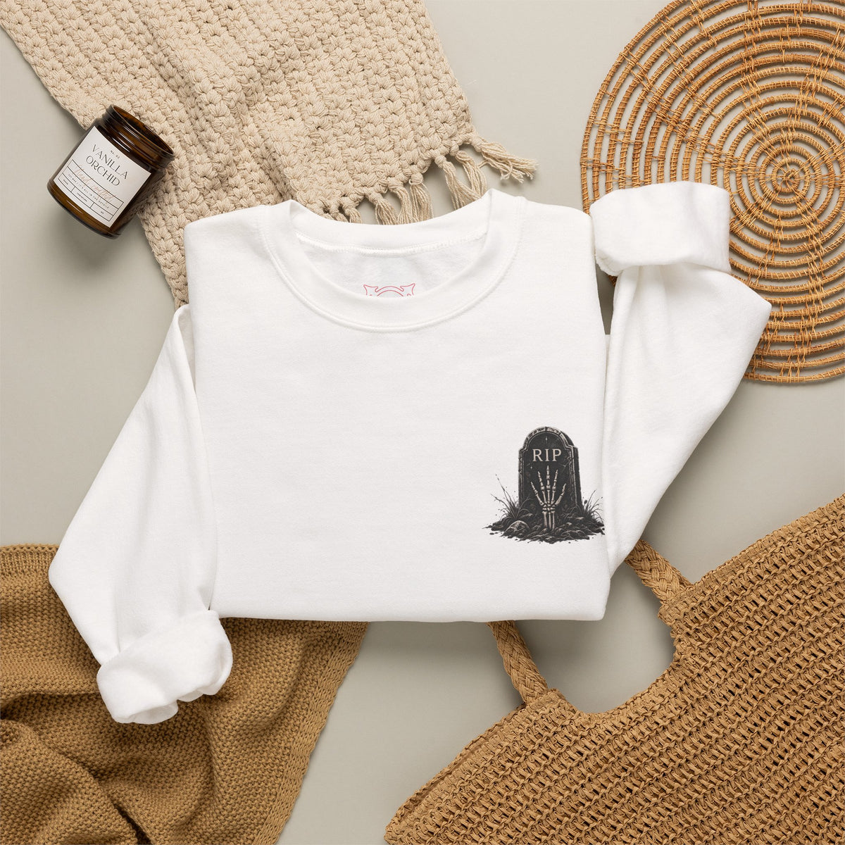 RIP Tombstone Sweatshirt in White — folded view