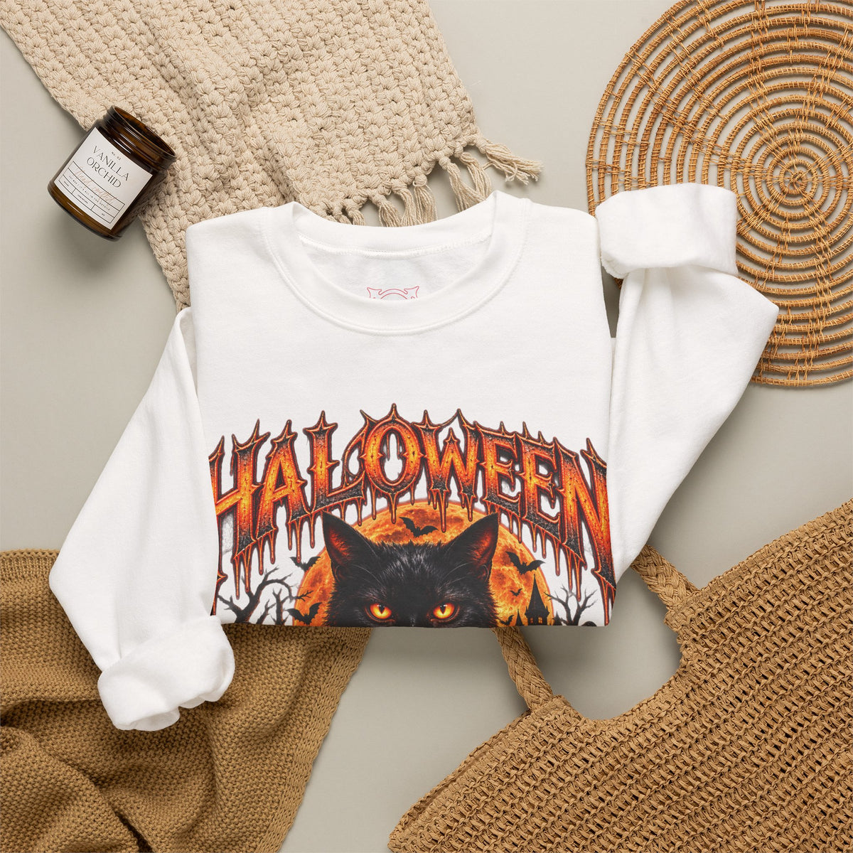 Bad Luck Follows Black Cat Sweatshirt in White — folded view