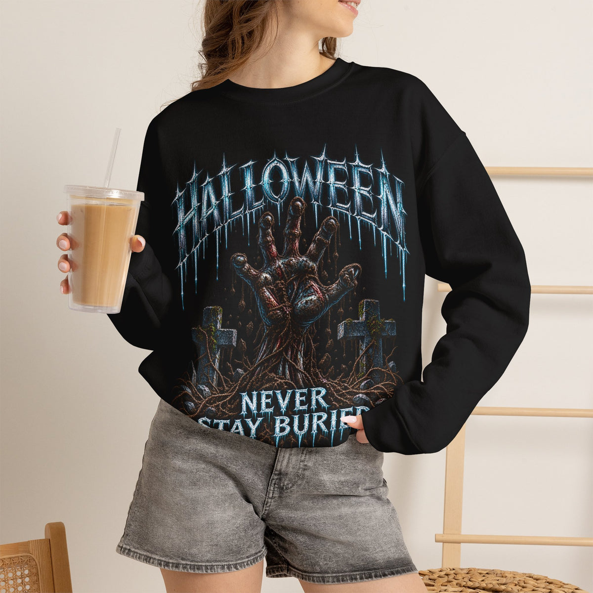 Never Stay Buried Zombie Hand Sweatshirt in Black — model view